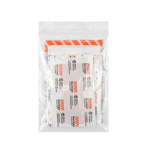 Bande et pensement SONORA, dispositif médical pour la fixation ou le soutien, visible en tissu blanc et adhésif.