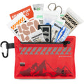 Trousse de premiers secours compacte de la marque SONORA, contenant des bandages, antiseptique et outils essentiels.